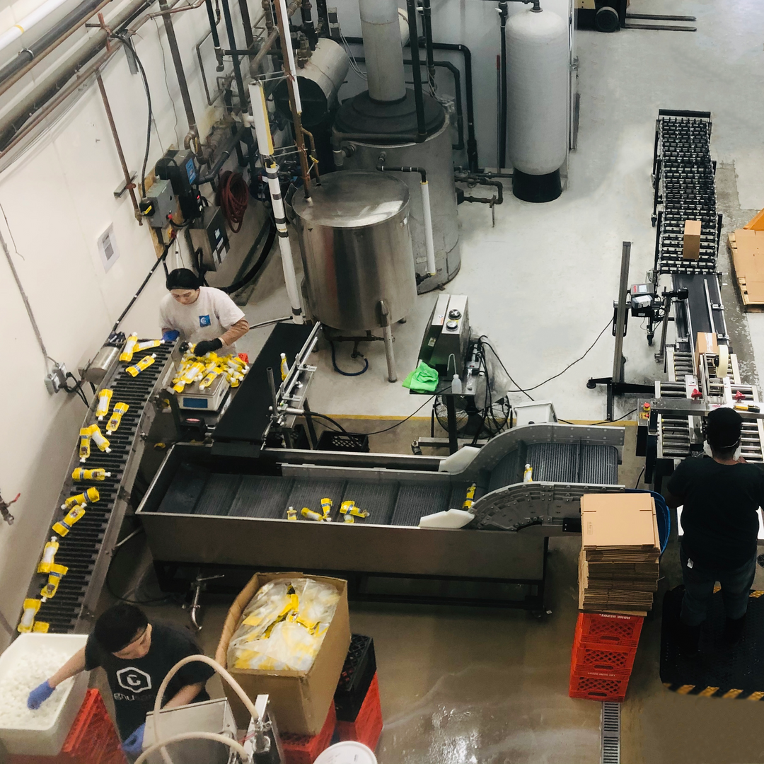 gnusanté's small batch production facility running looking over conveyers and tanks